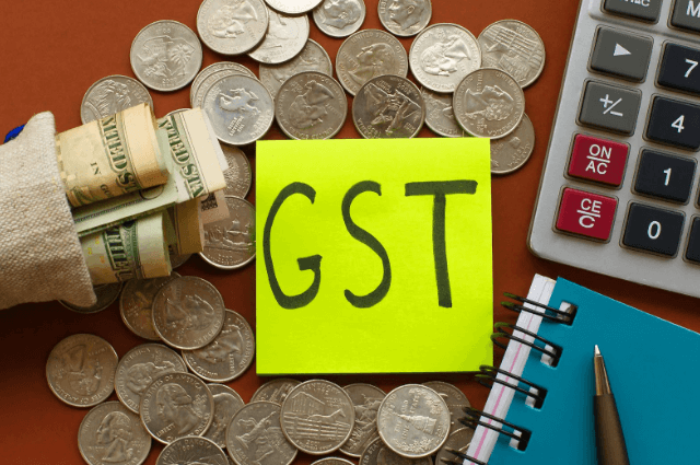 gst and money on table