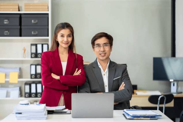 Understanding Different Accounting Types: A Beginner's Guide 3 man and woman posing in the office