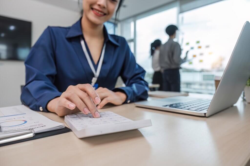 woman doing her work on a laptop