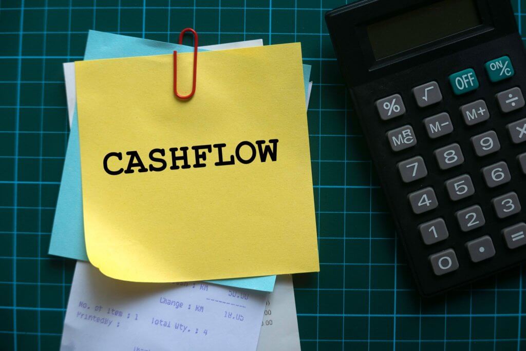Cash Flow Management: Your Path to Financial Stability 2 a sticky notepad with the word cashflow in it
